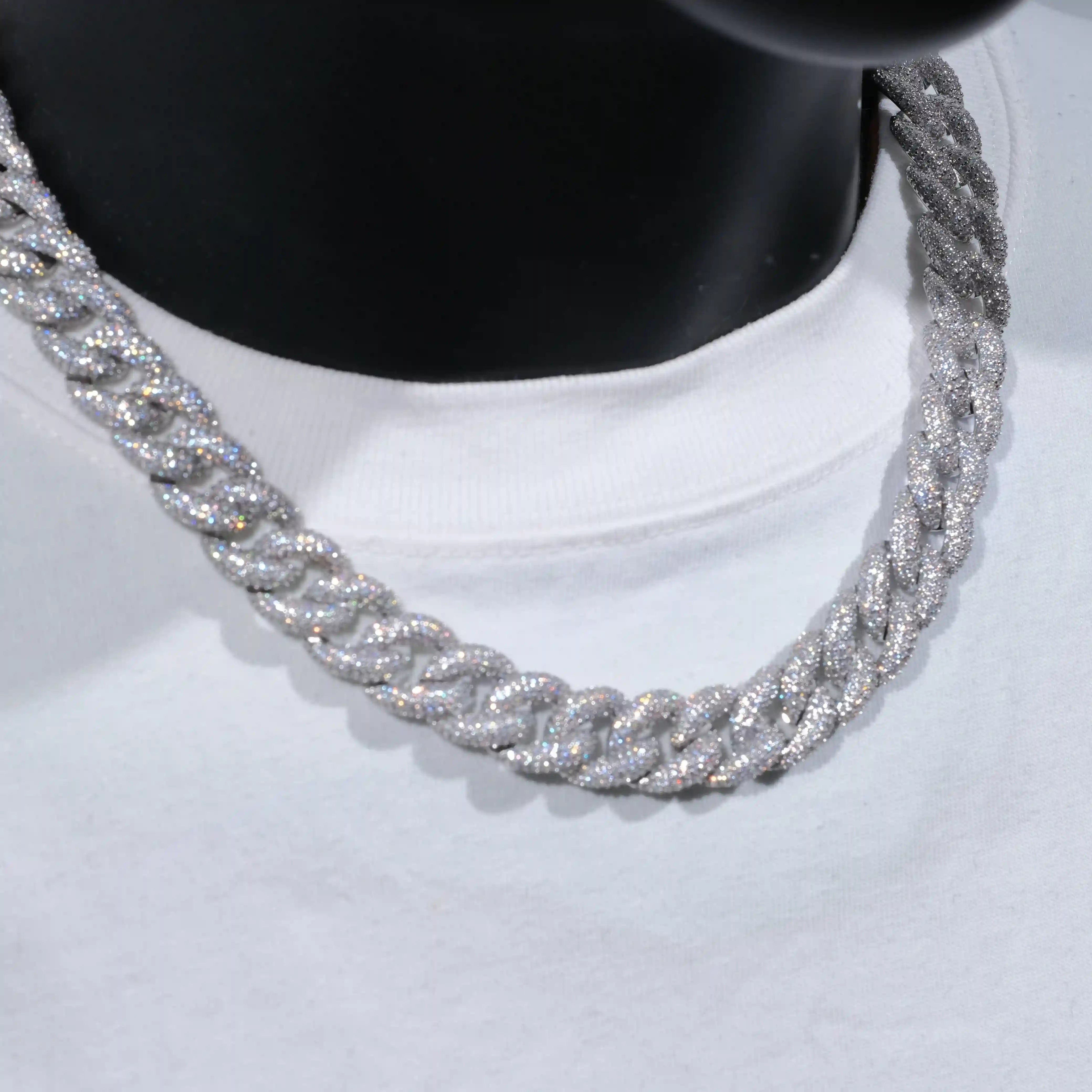 New 15mm 5-Row Cuban Chain with high-quality VVS simulated diamonds. Handcrafted with iced out clasp. Available in 18 or 20 inches. Material: Copper with 18K Gold/WhiteGold Finish. Includes chain, dust bag, gift box, jewelry cloth, and warranty card.