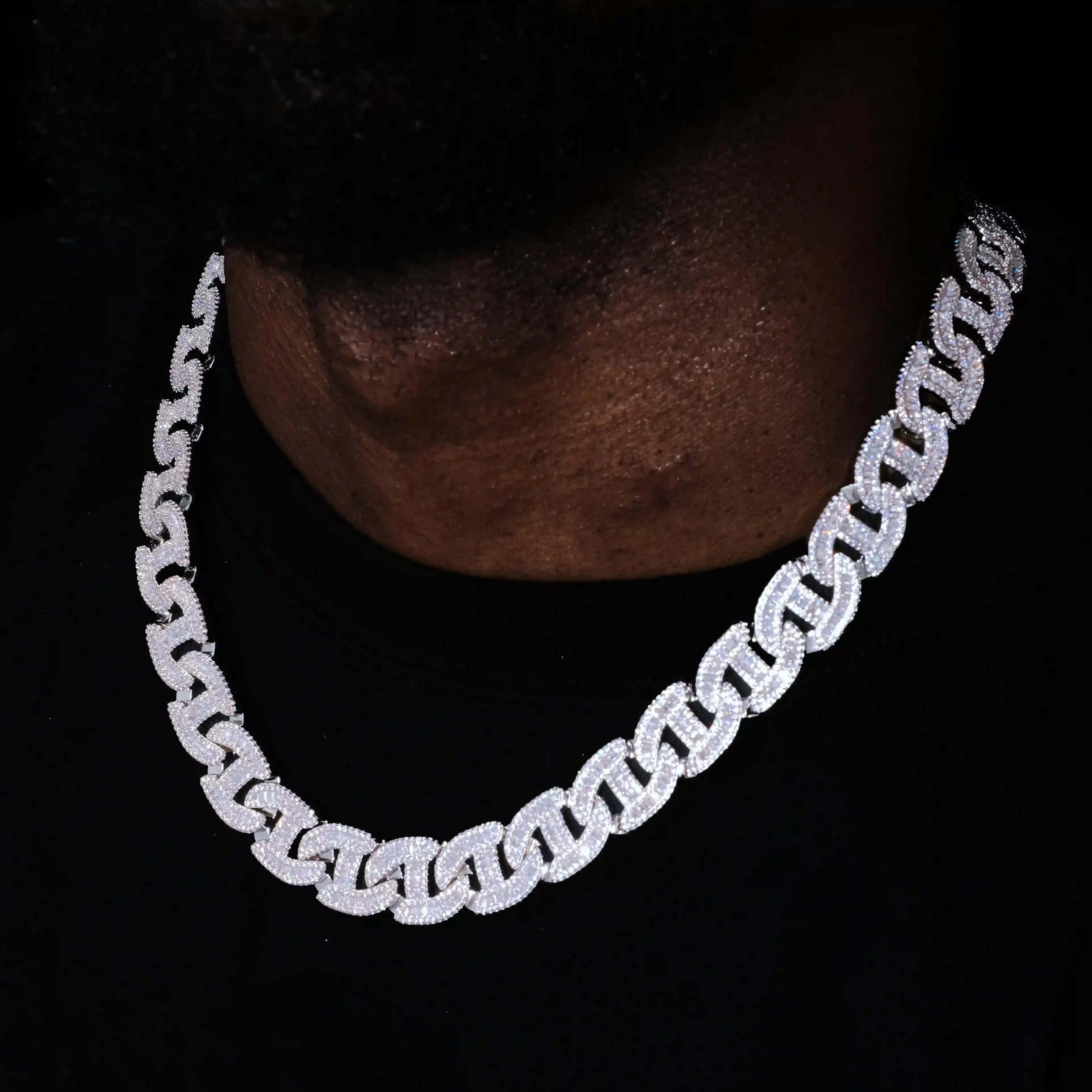 Upgrade any outfit with our 15mm Baguette Chain Link Necklace. Featuring dazzling baguette-cut stones, it's the perfect statement piece. Comes with chain, dust bag, gift box, jewelry cloth, and warranty card.